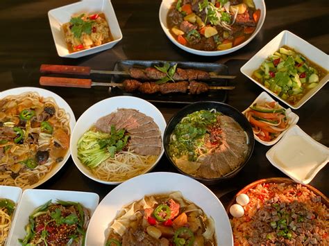 Kusan uyghur cuisine - Kusan is the bridge between Uyghur culture and America, and this mission is woven throughout everything we do. In our branding, the figure represents a traveler on the Silk Road. ... Kusan Cuisine ...